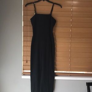 Wide leg black jumper. Adjustable straps